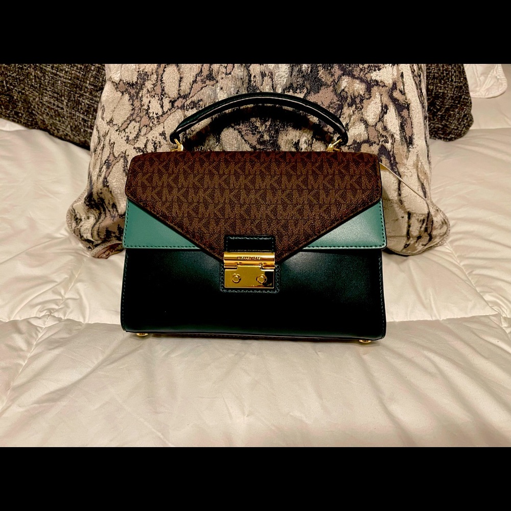 Brand new with tags Michael Kors bag tags original packing